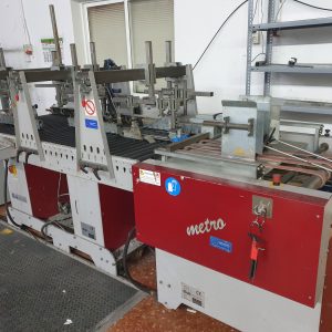 máquina usada para pegar cajas de cartón